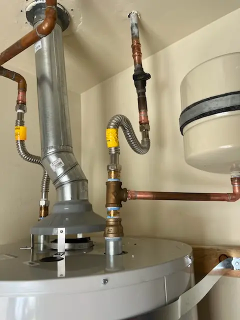 Water heater installation and plumbing repair in Charleswood